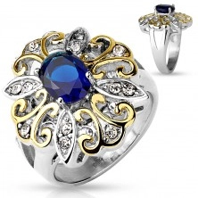 Anello grande realizzato in acciaio 316L, fiore grande in due colori, zircone ovale in colore blu scuro
