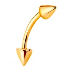 Piercing realizzato in oro giallo 9K - barbell lucido arcuato che finisce con due coni