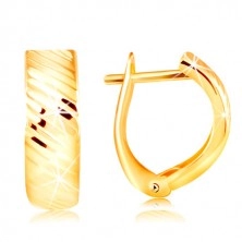 Orecchini in oro 14 - arco con intagli brillanti su diagonale