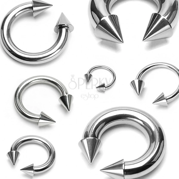 Piercing in acciaio inox colore argento - ferro di cavallo che finisce con punte
