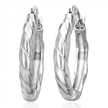 Orecchini rotondi intrecciati realizzati in acciaio inox, colore argento