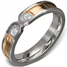 Anello d'acciaio - fascia in colore oro con bordatura in colore argento, due zirconi chiari